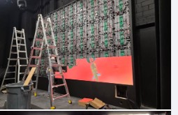 LED panels being installed on the mounting frame