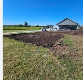 Dirt work in progress with truck on site